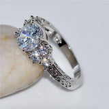 (9 To 5) Pure Sliver Ring With Inside White Diamond